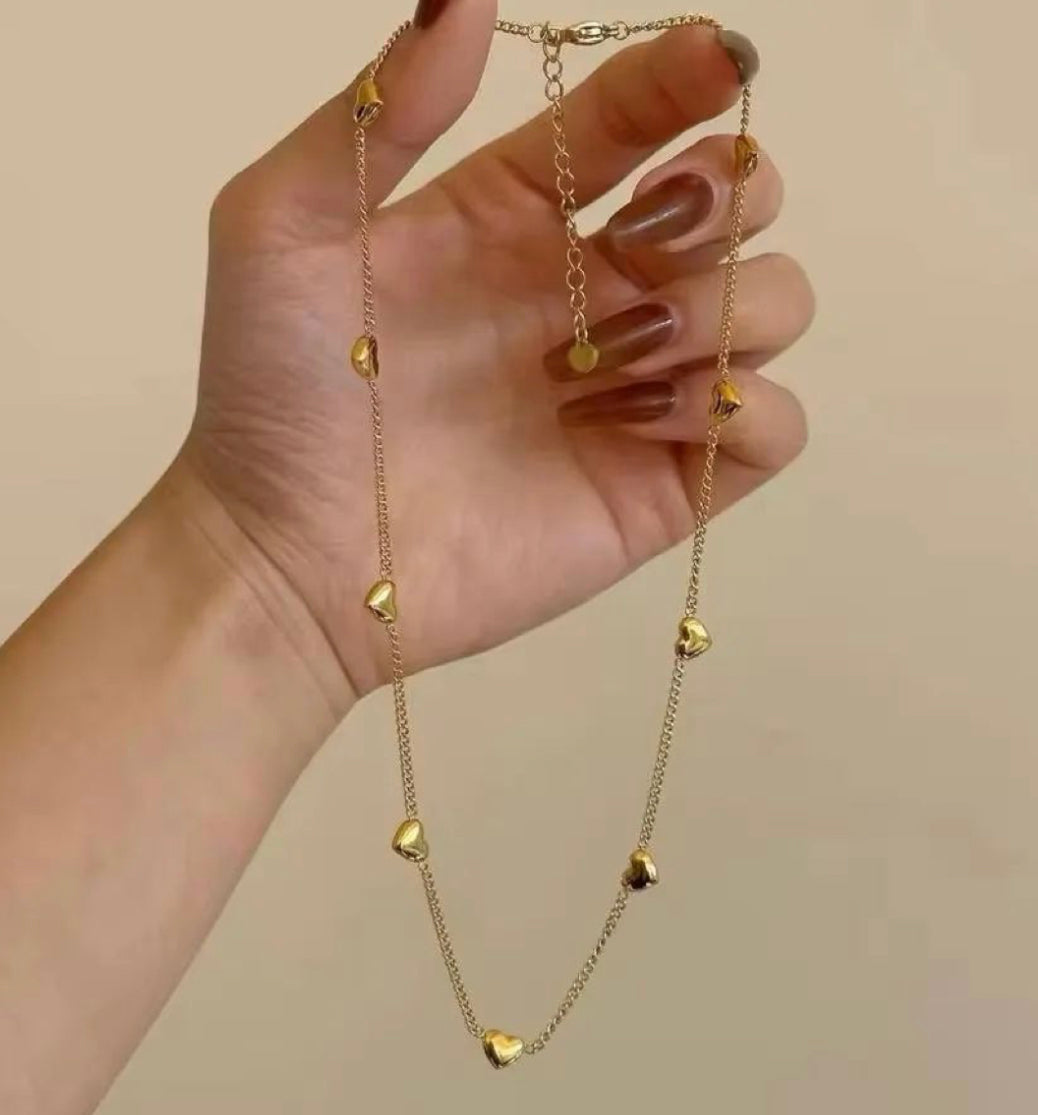 Tiny Gold Hearts Necklace