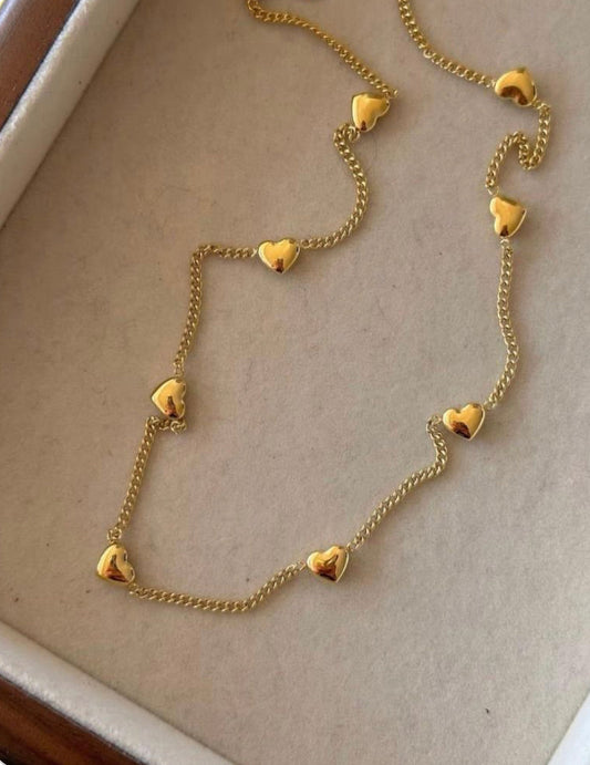 Tiny Gold Hearts Necklace