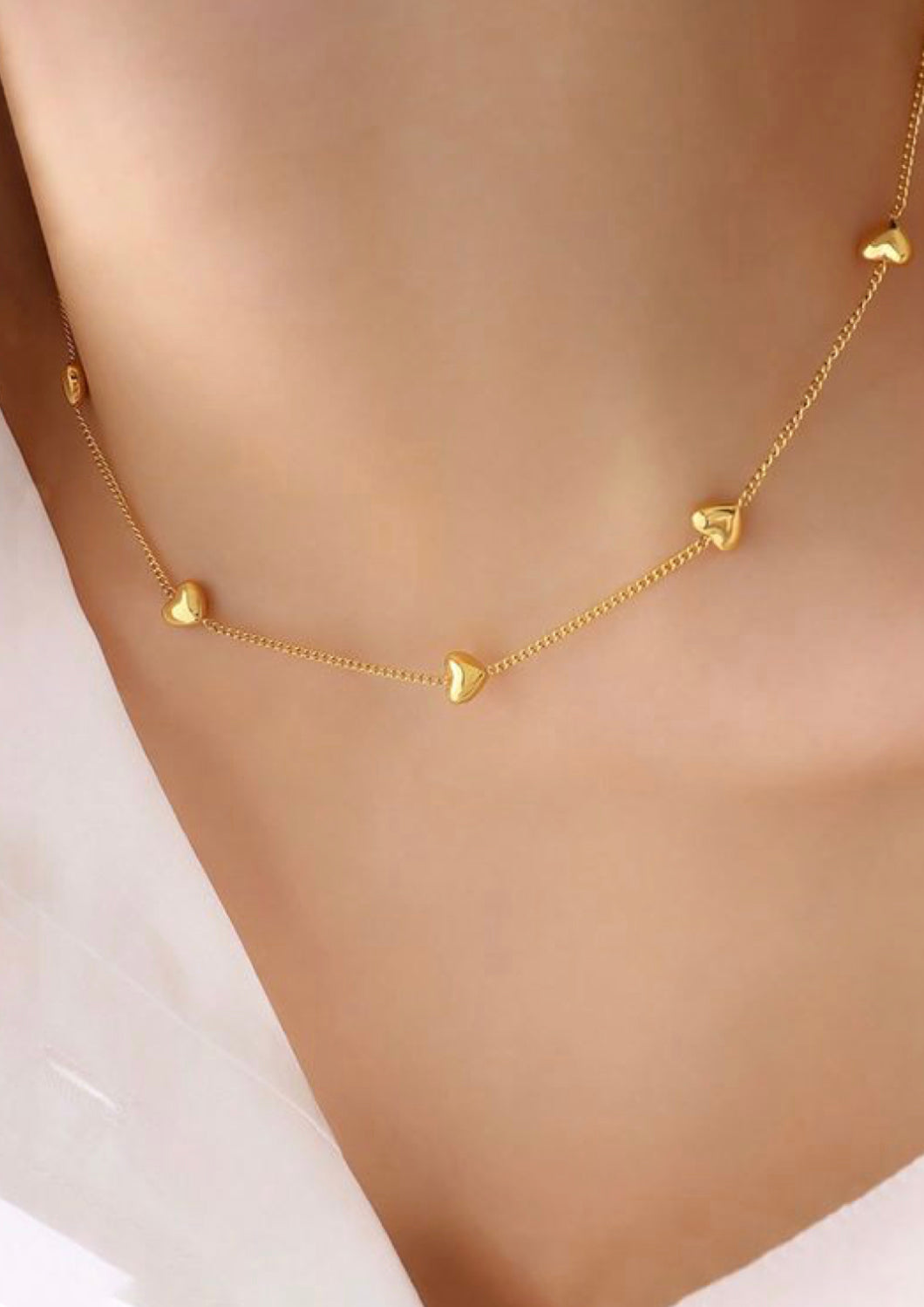 Tiny Gold Hearts Necklace