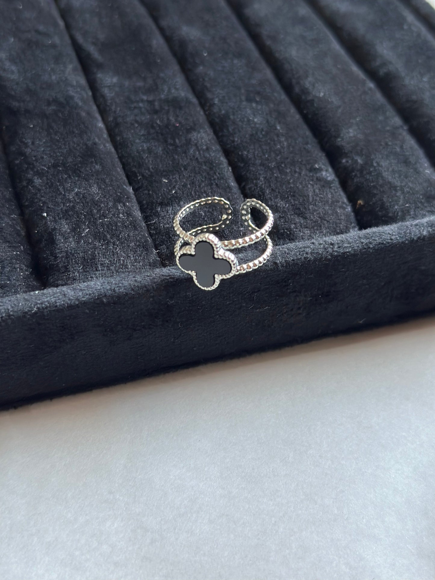 Silver colored vancleef ring